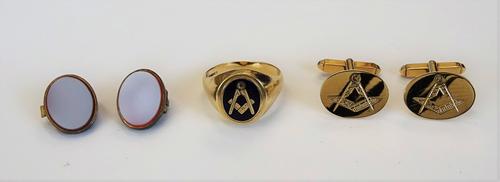 A 9ct gold and blue enamelled Masonic signet ring, the oval bezel rotating to show a square and compasses motif to one side and plain to the other sid