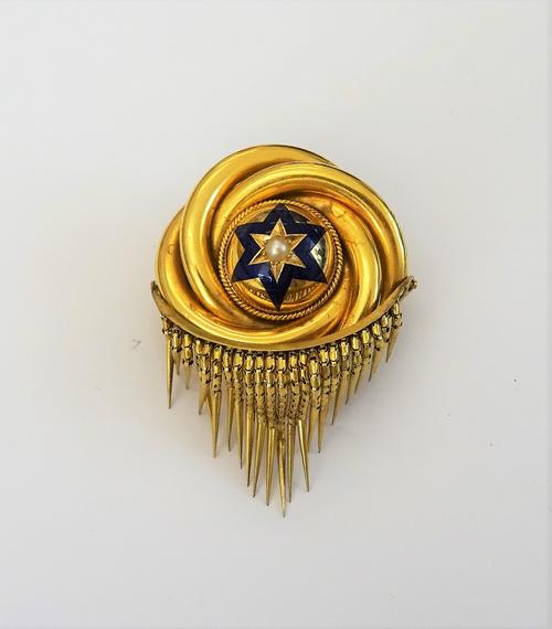 A Victorian gold, half pearl set and enamelled brooch, in an entwined circular design, mounted with a single half pearl to the centre, in a six pointe