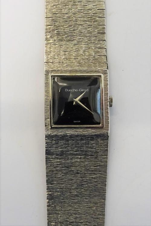A Bueche-Girod 9ct white gold bracelet wristwatch, the signed square black dial, with tapered silvered numerals, on a tapering wide brick link bracele