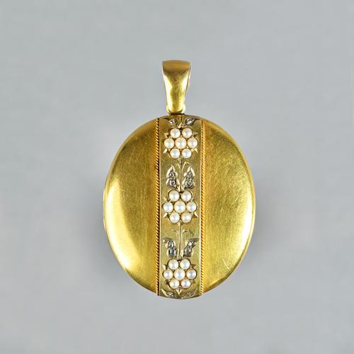 A Victorian gold, rose diamond and seed pearl set oval pendant locket, the front decorated with a central band, formed as a row of three seed pearl se