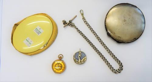 A gentleman's silver graduated curb link watch Albert chain, fitted with a silver T bar and a base metal swivel, a lady's gold cased, keyless wind, op