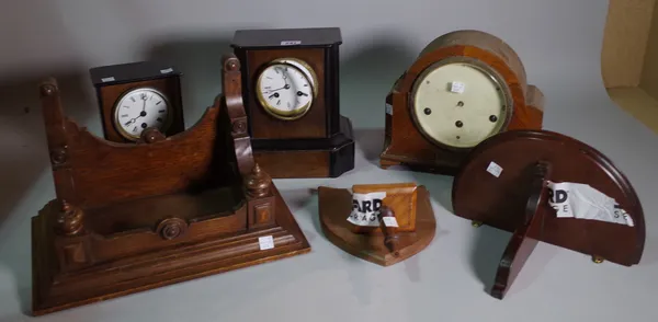 Horological interest, comprising; a group of five 20th century wall mounted clocks and a bracket, (6).