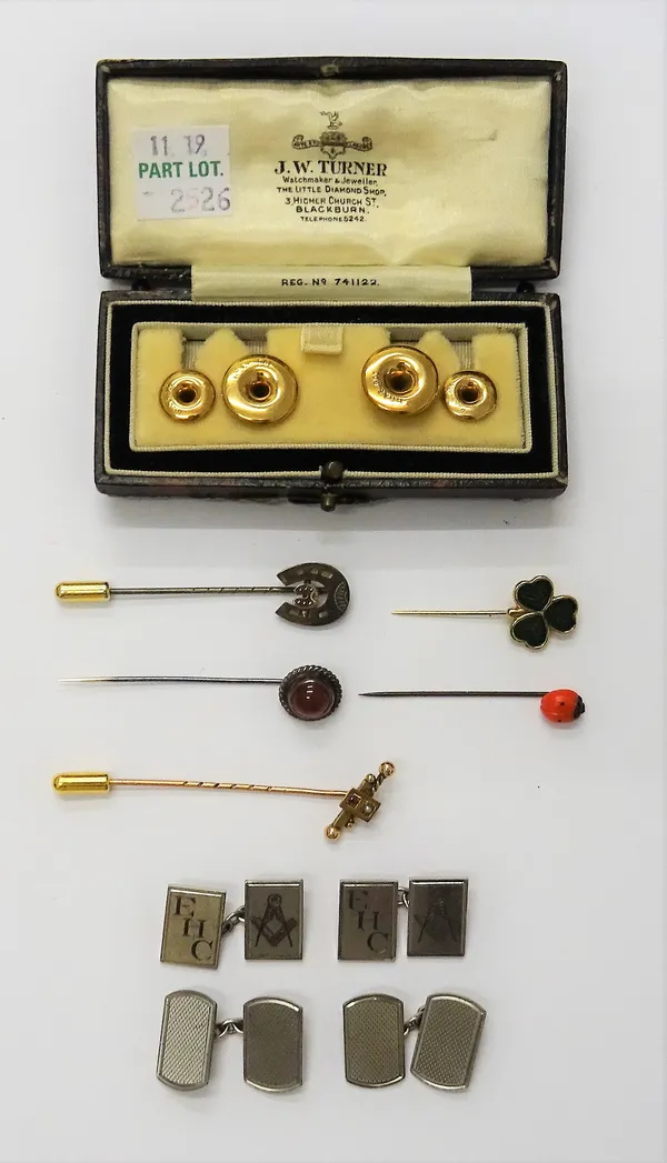 A set of four dress studs detailed 9ct, weight 3.3 gms, cased, a pair of cufflinks with engine turned decoration detailed silver, a pair of silver cuf