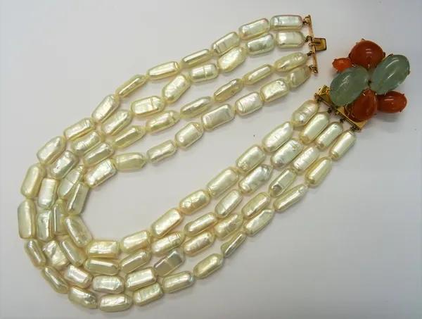 A graduated four row cultured pearl necklace, the clasp designed as a brooch, set with aquamarines and orange hardstone cabochons, (possibly mandarin