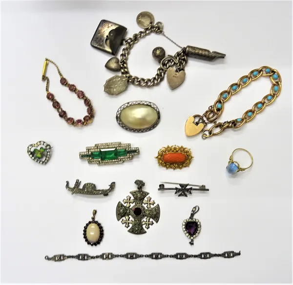 A gold filigree and carved coral brooch, circa 1830, a charm bracelet, fitted with six items, including a silver postage stamps case, Birmingham 1903