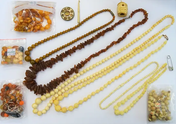 Two single row necklaces of varicoloured mottled butterscotch coloured amber beads, a single row necklace of graduated rough amber beads, five further