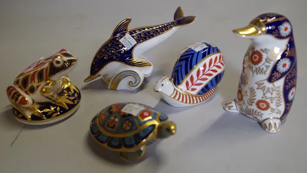 A group of five Royal Crown Derby imari pattern paperweights, comprising; terrapin, snail, dolphin, frog and platypus.