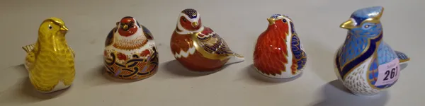 A group of five Royal Crown Derby imari pattern paperweights, comprising; a blue jay and four songbirds.