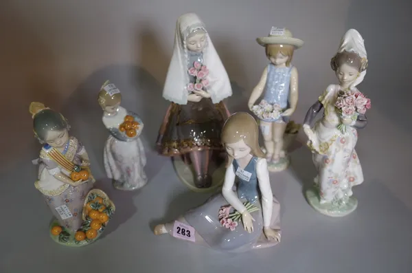 Ceramics, Lladro; a group of six models of girls carrying flowers and fruit, etc.