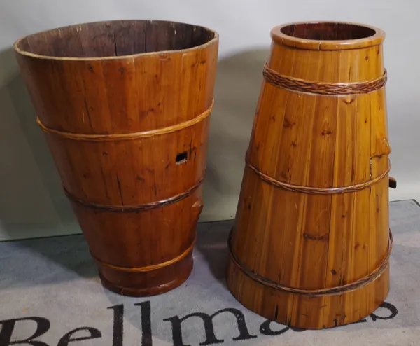 A pair of 20th century pine buckets of tapering form, 56cm wide x 60cm high, (2).