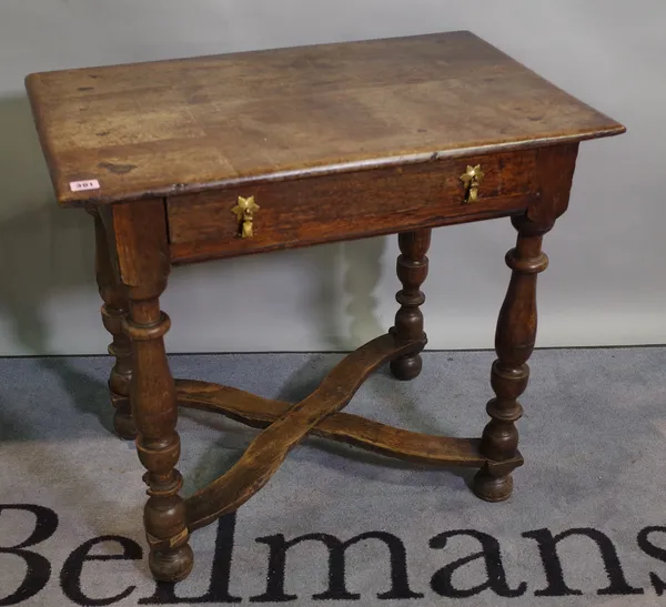 An 18th century continental oak single drawer side table on 'X' frame stretcher, 74cm wide x 68cm high.