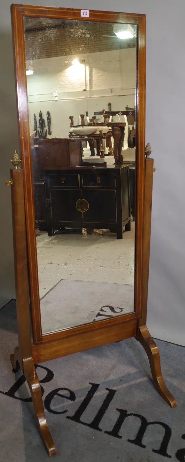 An Edwardian mahogany and inlaid cheval mirror on outswept supports, 51cm wide x 159cm high and a pair of Edwardian hall chairs, (3).