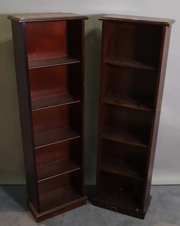 A pair of 20th century mahogany open bookcases on plinth base, 38cm wide x 129cm high.