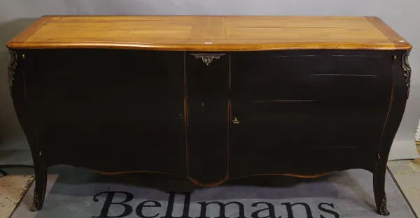 A 20th century French black painted sideboard of bombe form, 180cm wide x 90cm high.