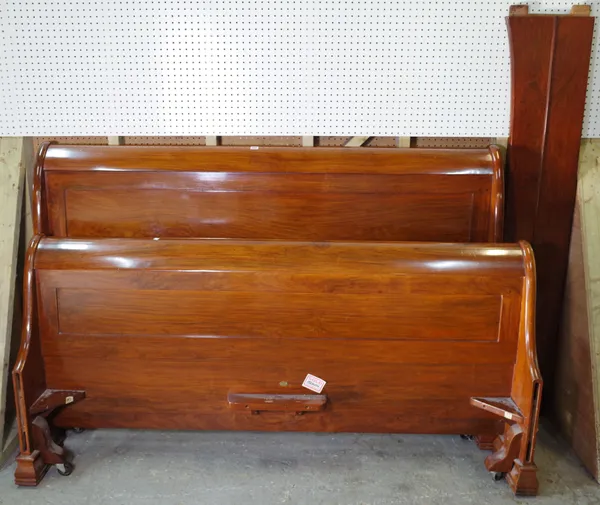 Simon Horn 1996; a 20th century walnut king size sleigh bed, 188cm wide x 125cm high.