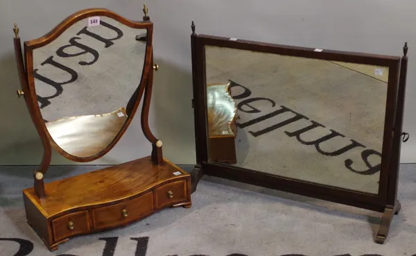 A George III mahogany serpentine shield back toilet mirror with three frieze drawers 43cm wide x 59cm high, a 19th century mahogany swing frame mirror