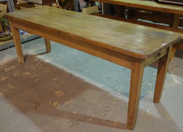 A late 19th century rectangular pine kitchen table with single drawer on tapering square supports, 213cm long x 66cm wide x 74cm high.