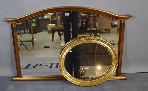 A 20th century gold painted arch top overmantel wall mirror, 121cm wide x 81cm high.