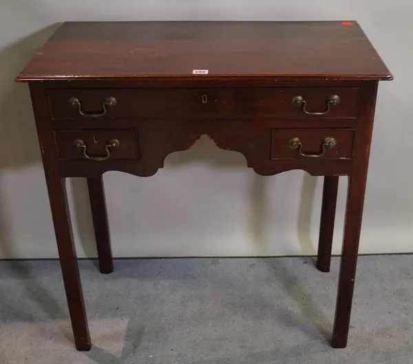 A George III style mahogany side table with three frieze drawers, 76cm wide x 77cm high.