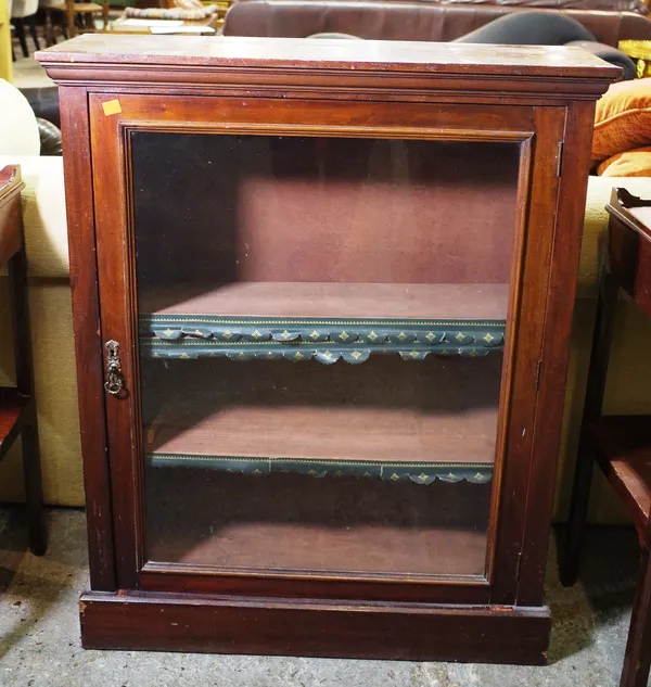 A 19th century mahogany single door display cabinet on plinth base, 83cm wide x 103cm high.