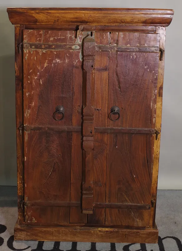 A 20th century Indian hardwood side cabinet 76cm wide x 118cm high.