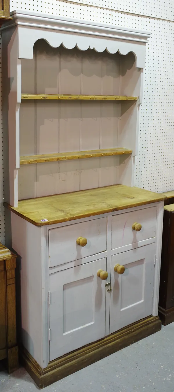 An early 20th century blue painted pine dresser with two tier plate rack on plinth base, 92cm wide x 193cm high.