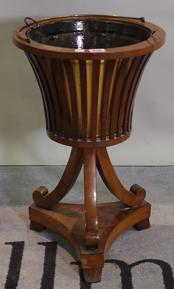 A 19th century Dutch mahogany slatted jardiniere stand on trefoil base, 35cm wide x 55cm high.