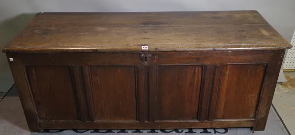 An 18th century and later oak panelled coffer, 159cm wide x 62cm high.