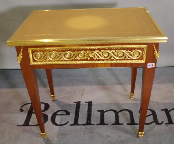 A Regency style stained beech gilt metal mounted single drawer low side table with brown leather inset top on tapering square supports, 68cm  x 67cm h