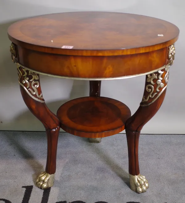 A Victorian style mahogany circular two tier centre table on silver painted claw feet, 66cm wide x 72cm high.