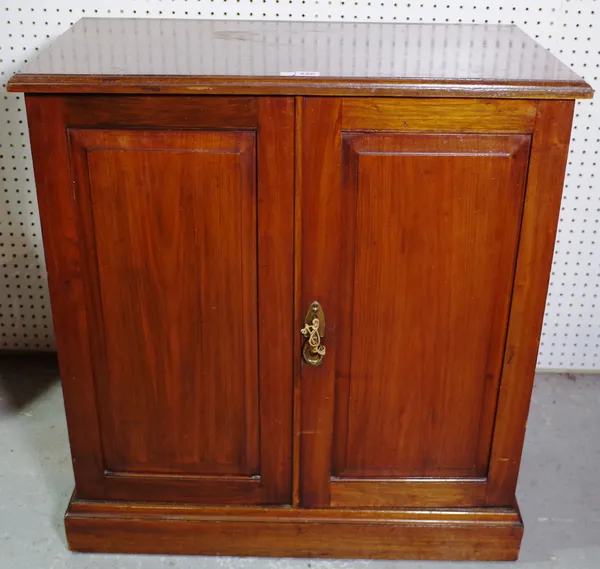 A late Victorian mahogany side cupboard with panelled doors, 76cm wide x 90cm high.