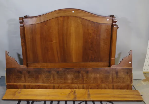 A late Victorian oak and walnut single bed, 128cm wide x 110 high.