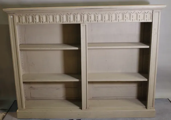 A late Victorian grey painted floor standing open bookcase, 164cm wide x 125cm high.