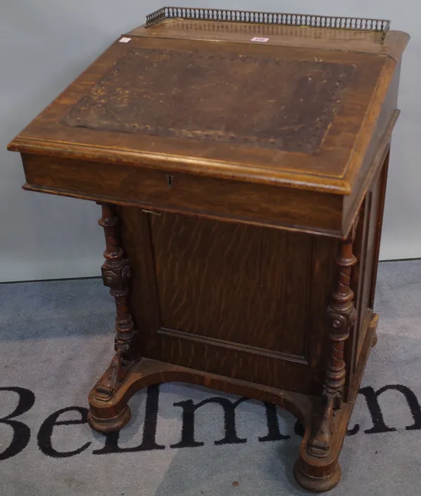 A Victorian oak Davenport 57cm wide x 84cm high.