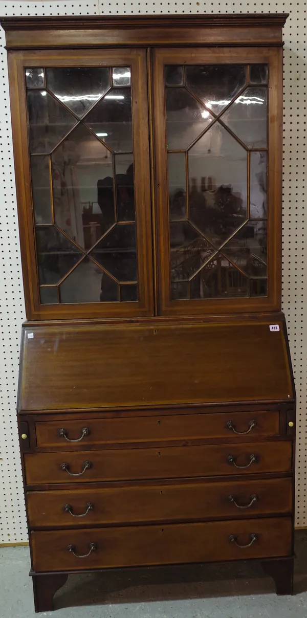 An Edwardian mahogany bureau bookcase with astragal glazed doors over four long graduated drawers on bracket feet, 89cm wide x 194cm high.