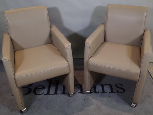 Medalounger; a pair of grey leather upholstered square back armchairs, 60cm wide x 84cm high, (2).