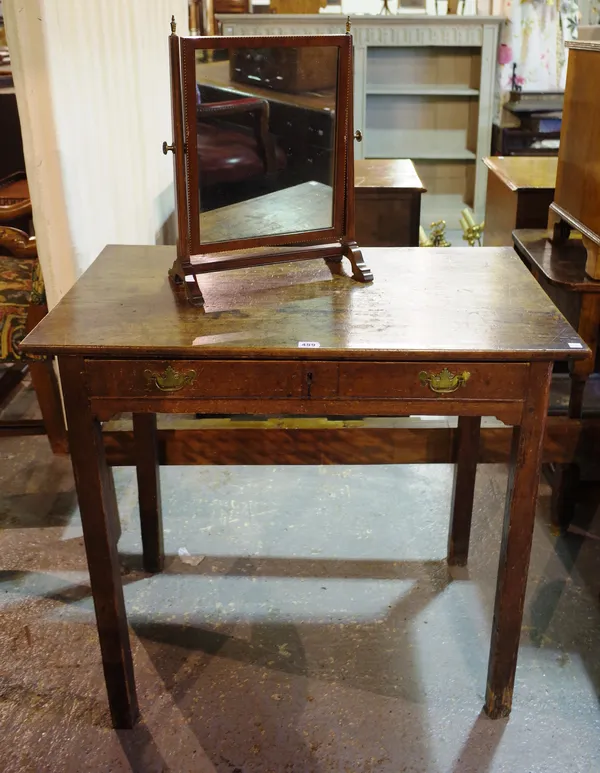 A mid-18th century mahogany single drawer side table on square supports, 86cm wide x 78cm high and a small toilet mirror, 33cm wide x 37cm high.