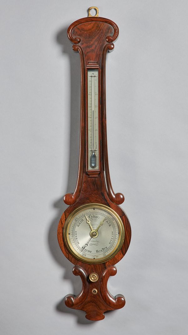 A small early Victorian rosewood wheel barometerBy Chamberlain, Bloomsbury, London, circa 1835The trunk inset with a thermometer above signed silvered