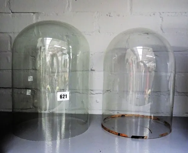 Two circular glass domes 32 and 31cm high; 23 and 21.5cm diam.