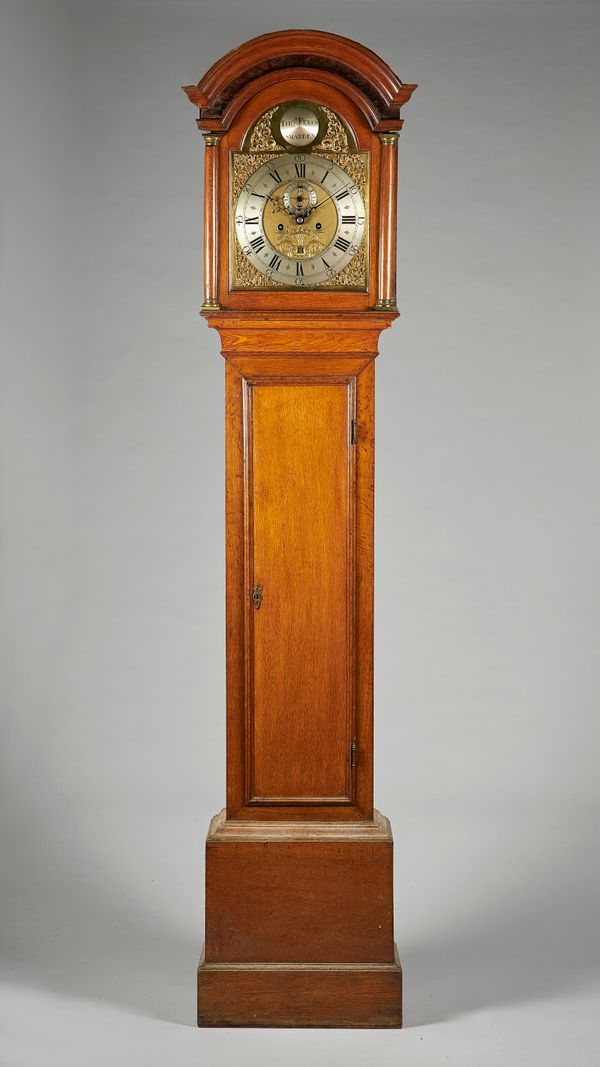 A George III oak longcase clockBy Thomas Peren, Smarden, circa 1770The case with an arched pediment above a pair of three-quarter columns and a glazed