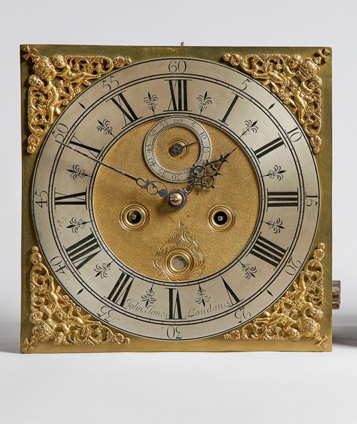 A George II longcase clock movementBy John Jones, London, circa 1705The 11in. square brass dial with twin cherub and Maltese Cross spandrels, enclosin