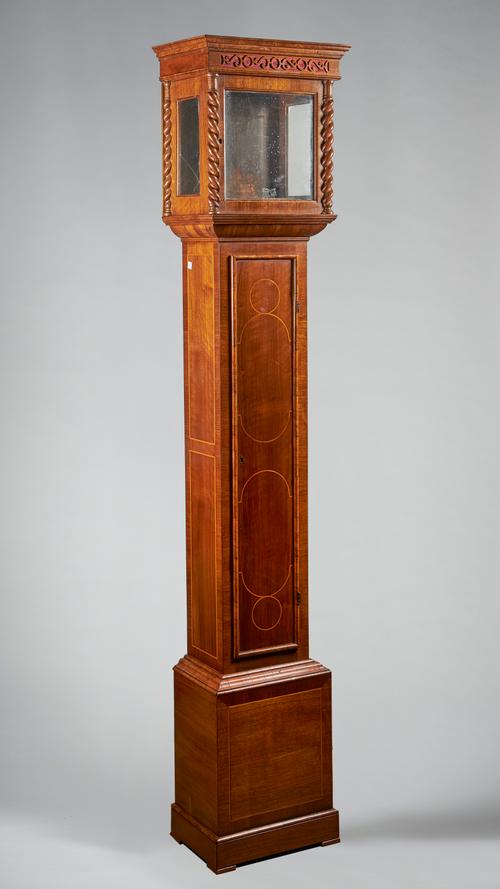 A walnut, crossbanded and boxwood-outlined longcase Circa 1900With 9in. square dial aperture, sliding hood184cm highProvenance: D. A. F. WetherfieldSo