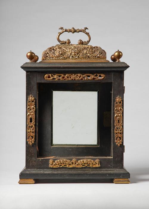 A giltmetal-mounted ebonised table clock caseLate 17th centuryWith pierced basket and four finials, on later block feet36cm high