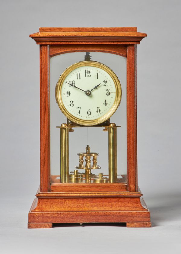 A mahogany cased torsion timepieceBy Gustav Becker, Freiburg, circa 1910The rectangular lift-off case with a stepped pediment above bevelled glass pan