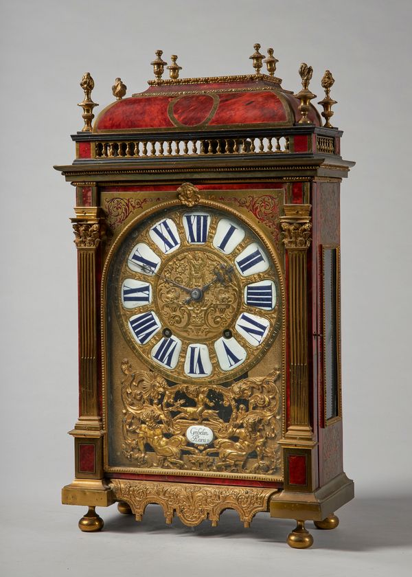 A Régence ormolu-mounted tortoiseshell and cut-brass inlaid mantel clockBy Nicolas Gribelin, Paris, circa 1700The case with a domed pediment surmounte