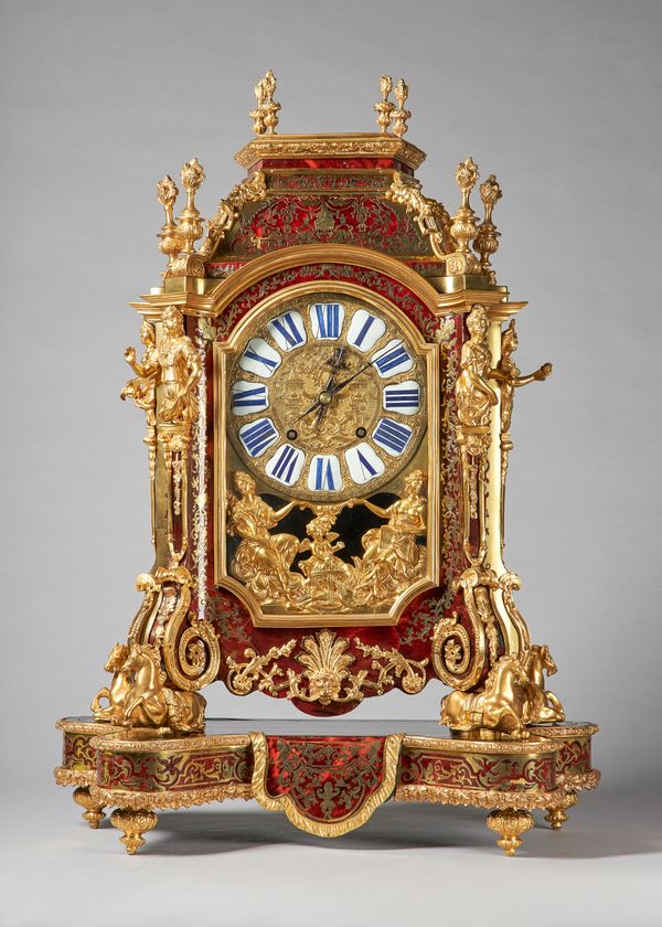 A Fine French ormolu-mounted, boulle and cut brass-inlaid mantel clockIn the Regence style, after André-Charles Boulle, second half 19th centuryThe st