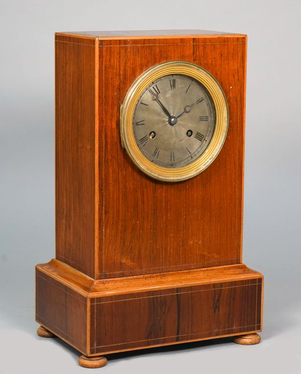 A Louis Philippe rosewood and boxwood-outlined mantel clockBy Berthet & Bazelaire, Paris, circa 1835The rectangular case with line inlay and stepped p