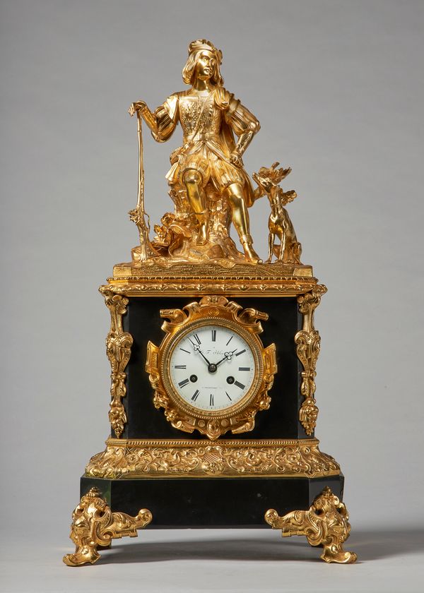 A French giltmetal and black marble mantel clockCirca 1860Modelled with a seated figure of a hunter on a rocky outcrop, holding a long gun, a seated h