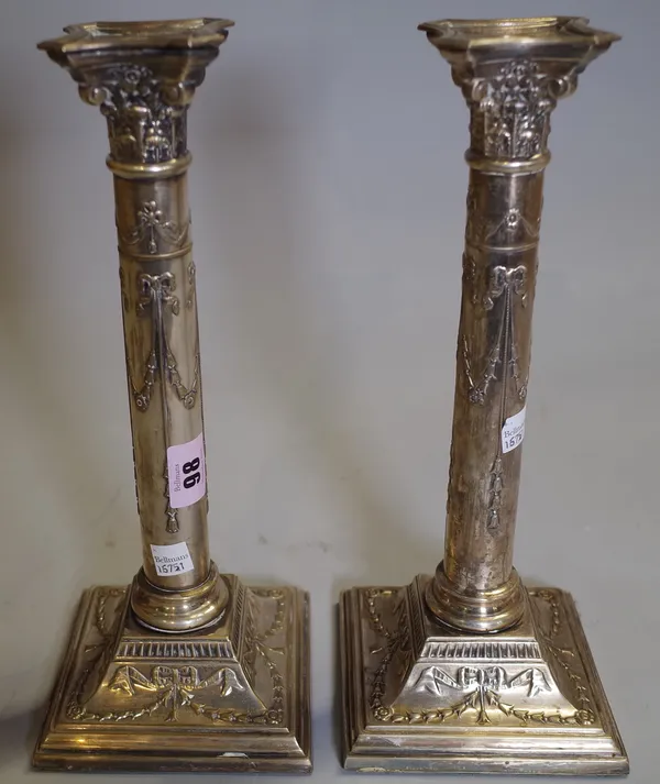 A pair of Regency style silver plated candlesticks, 31cm high (2).