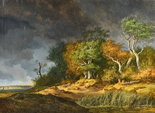 Circle of Johann Bernard Klombeck (1815-1893), A stormy landscape with an estuary beyond, oil on canvas, 100cm x 137cm.